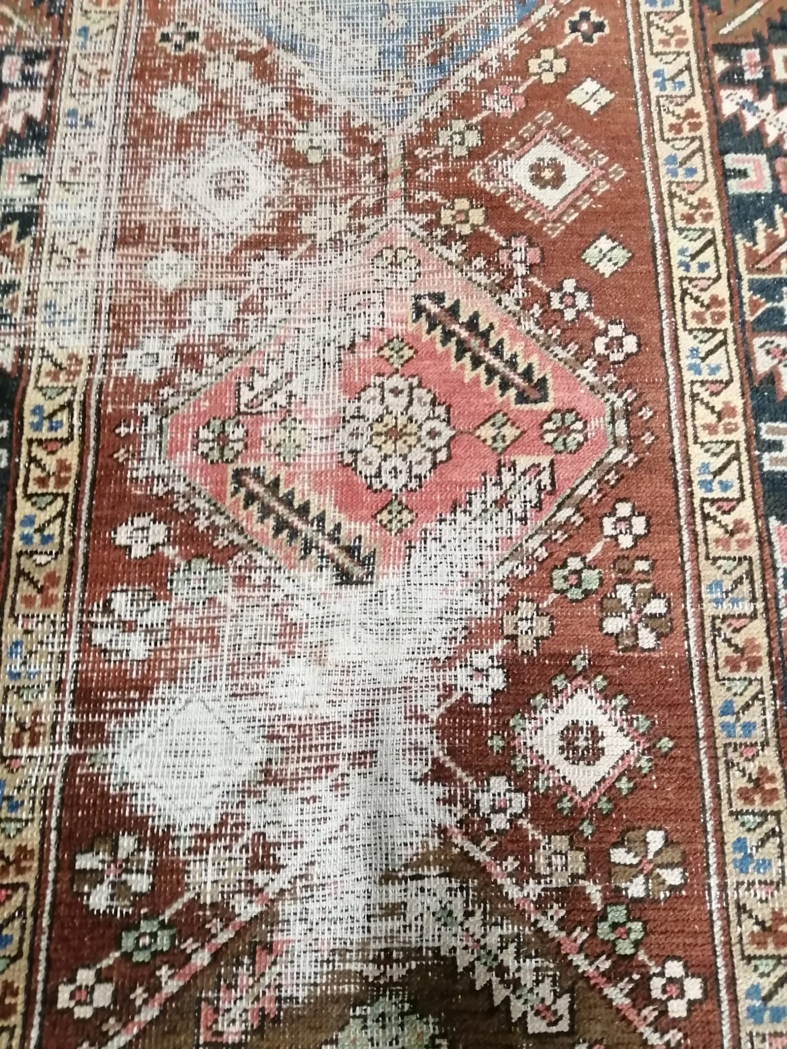 An antique Heriz runner, 362 x 95cm